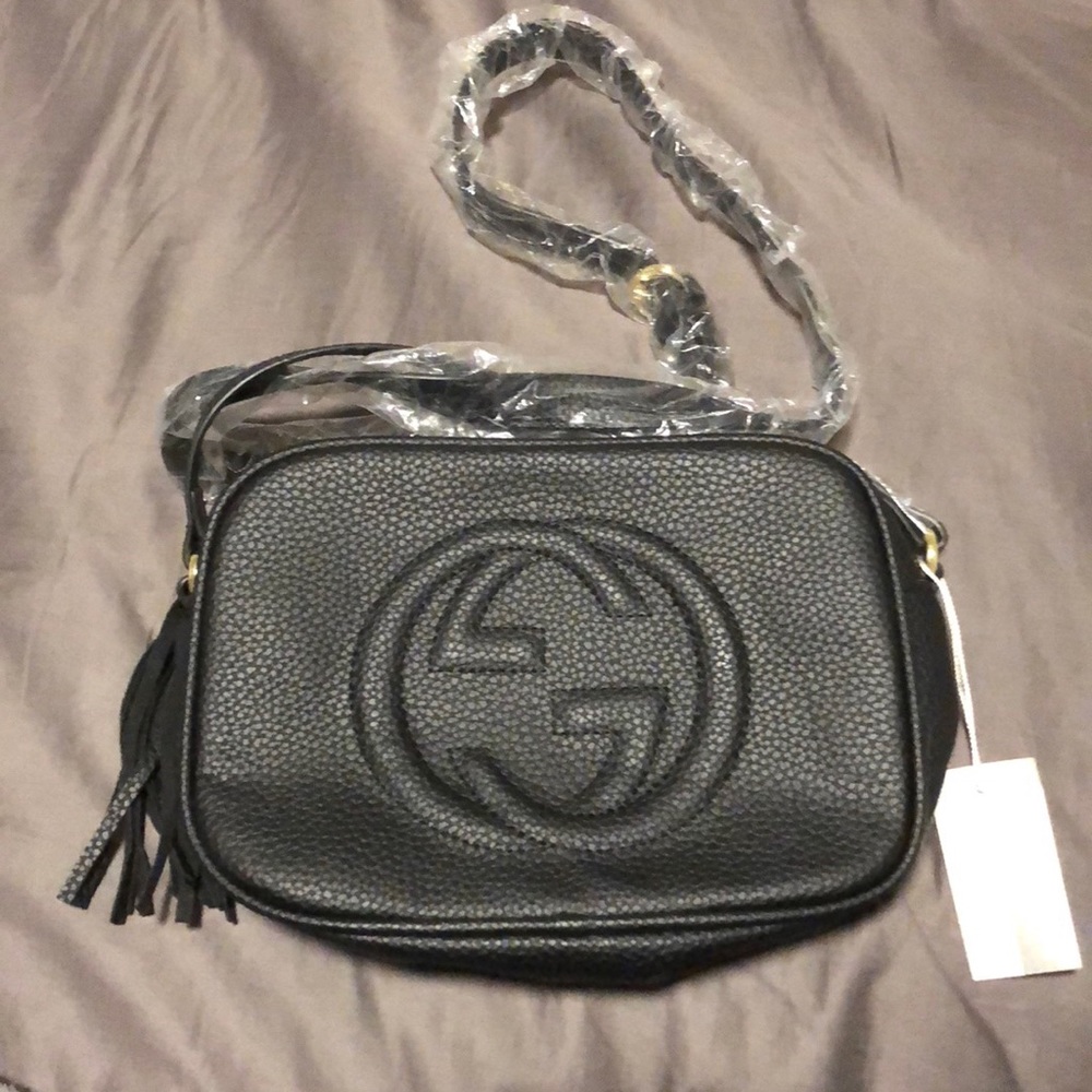 Black GG logo crossbody tassle purse